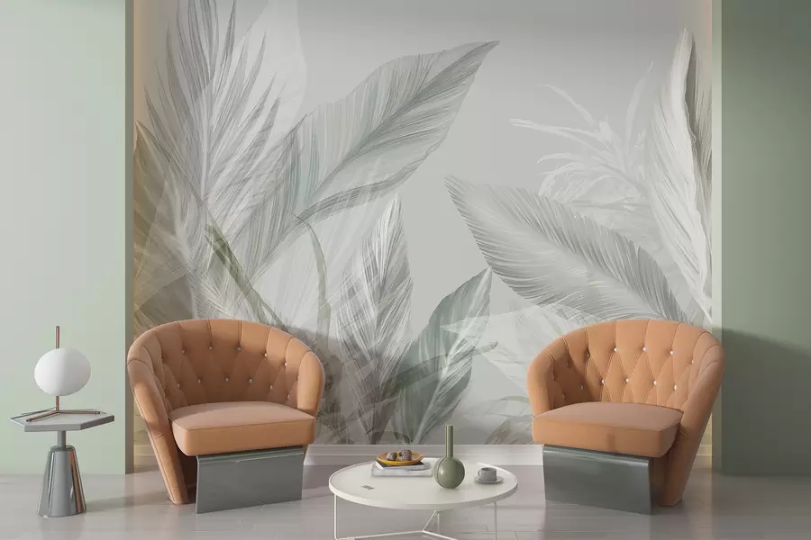 Papier peint photo Des plumes blanches, vertes et grises douces et des feuilles tropicales flottant sur un fond clair w08241