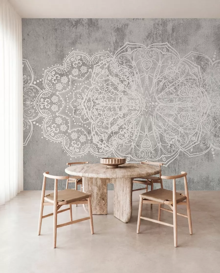 Papier peint photo Un motif de mandala en dentelle blanche, détaillé et complexe, sur un fond de mur gris loft texturé w08387