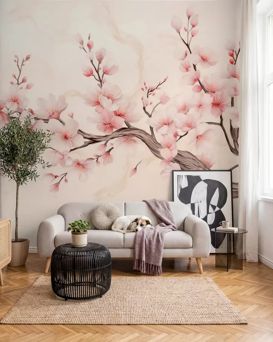 Fotobehang Een tere kersenbloesemtak met zachtroze bloemen op een lichte achtergrond w03079