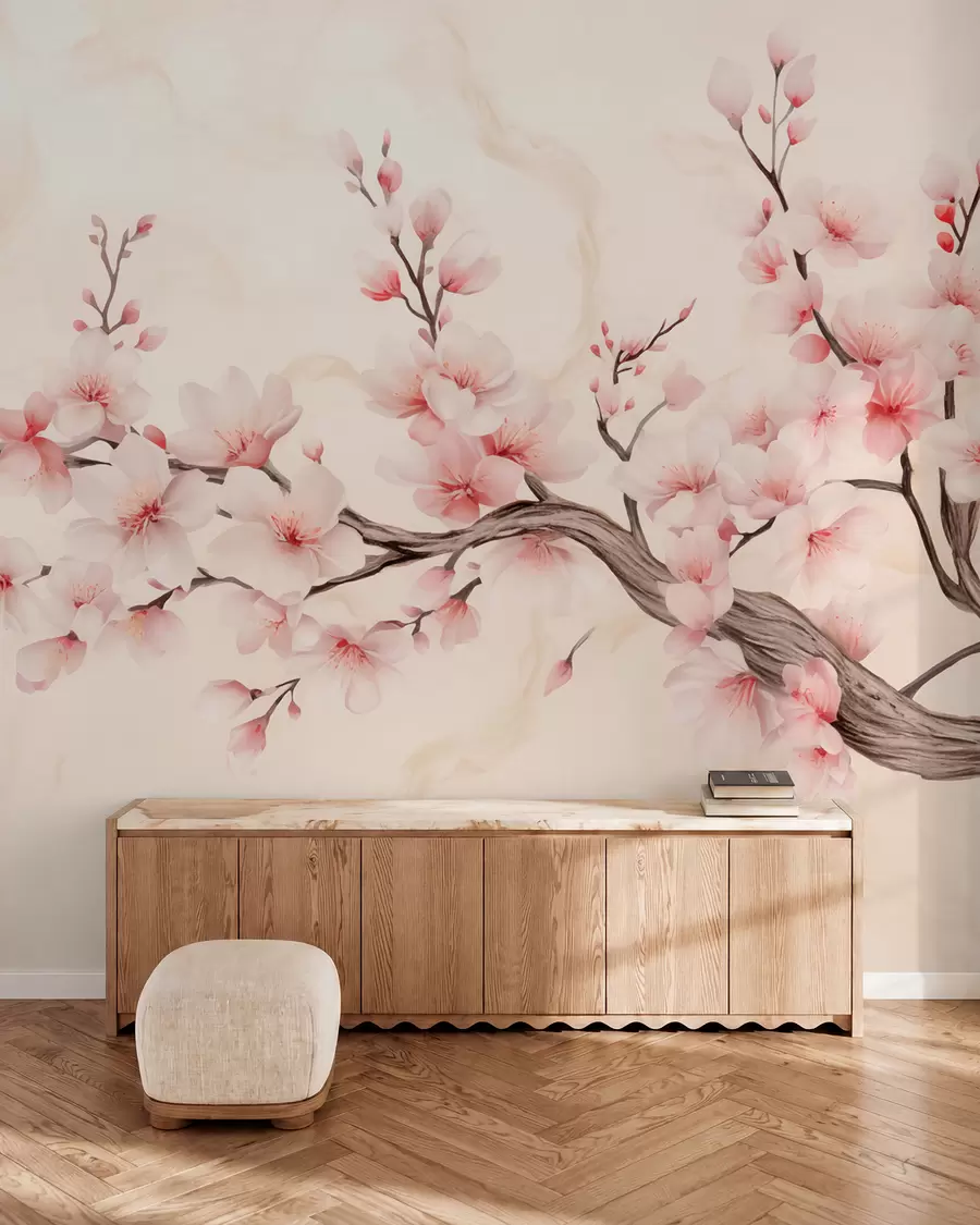 Fotobehang Een tere kersenbloesemtak met zachtroze bloemen op een lichte achtergrond w03079