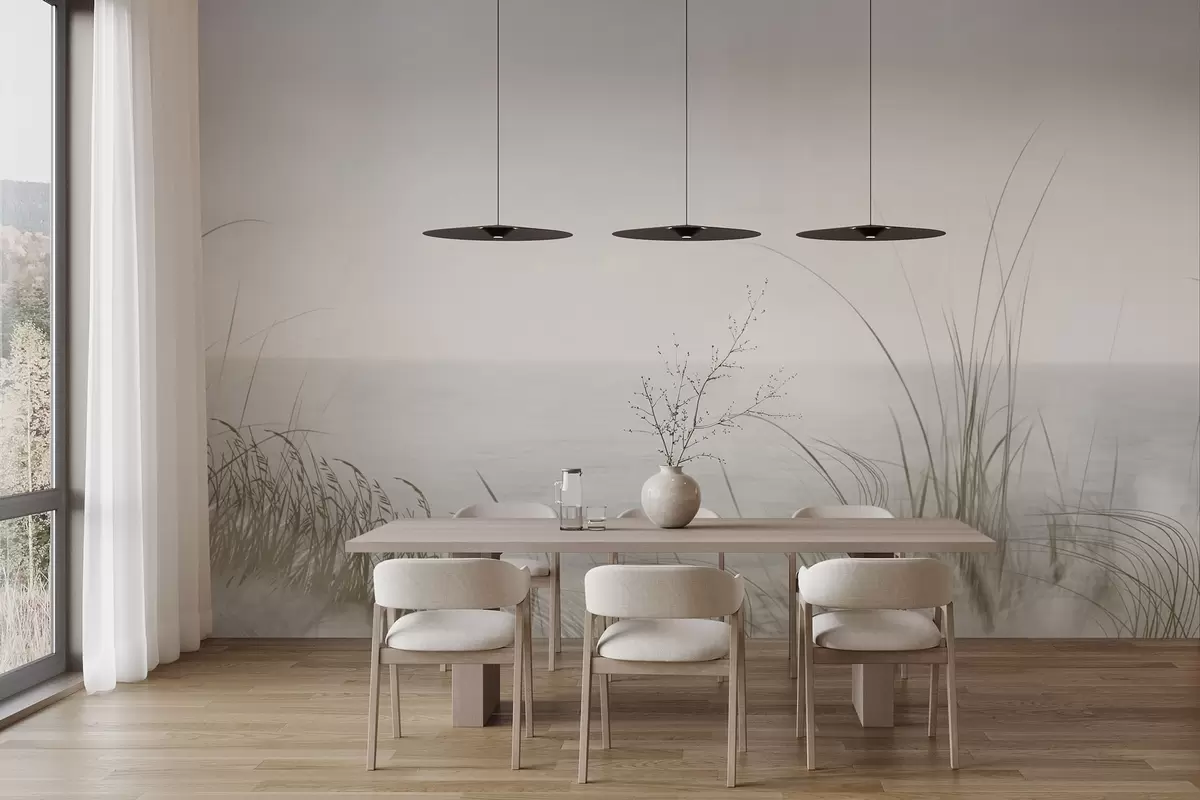 Papier peint photo Rivage brumeux avec des herbes délicates au premier plan w04339