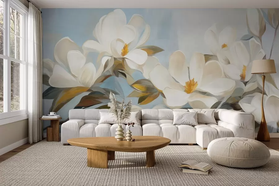 Fotobehang Witte magnolia's met groene bladeren op een lichtblauwe achtergrond met abstracte penseelstreken imitatie w09478