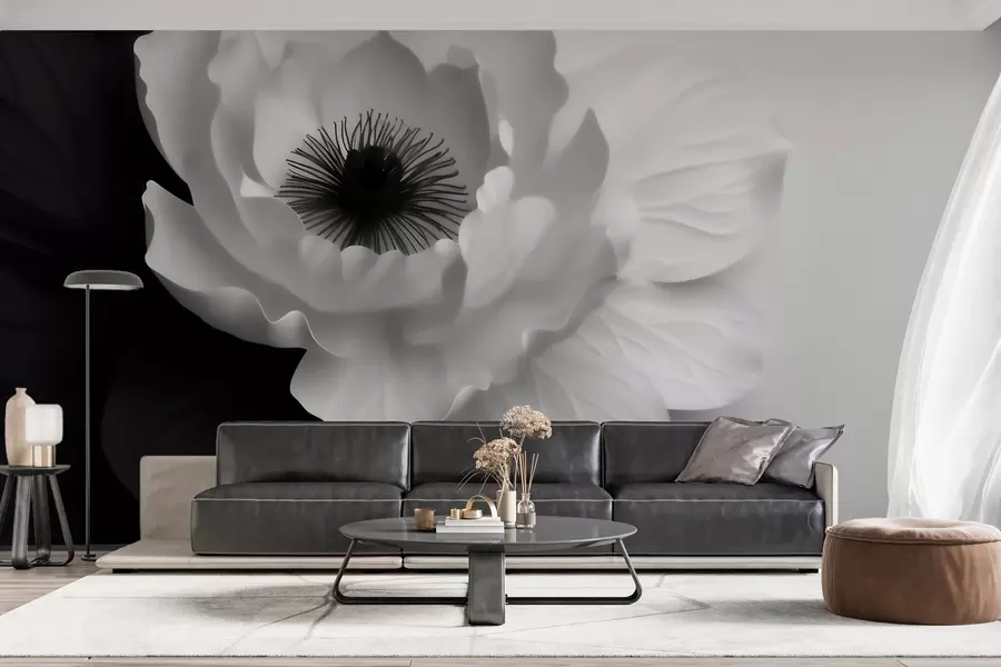 Fotobehang Een contrasterende witte bloem met een donker hart op een zwart-witte achtergrond w09852