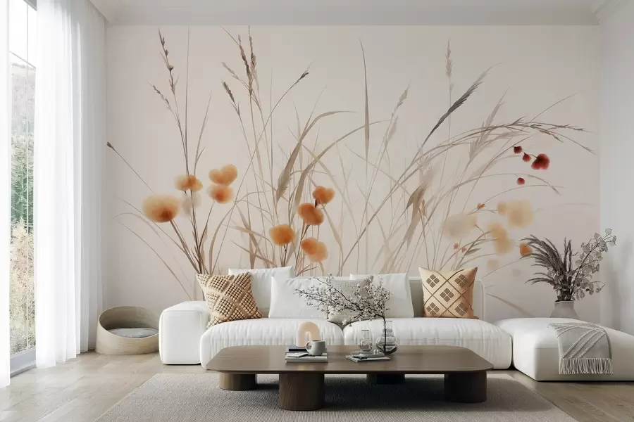 Fotobehang Hoog gras en kleine oranje wilde bloemen tegen een bleke achtergrond, in een boho-stijl met veel textuur w09902