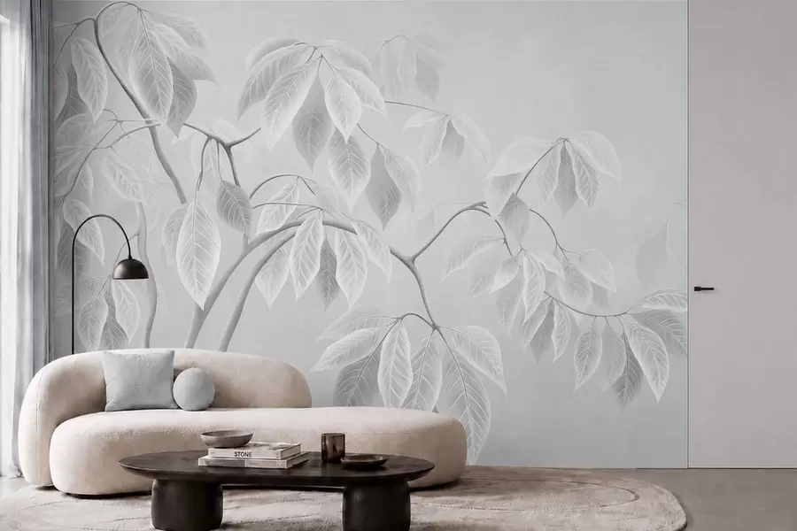 Papier peint photo Des branches claires aux grandes feuilles sur un fond clair w05806
