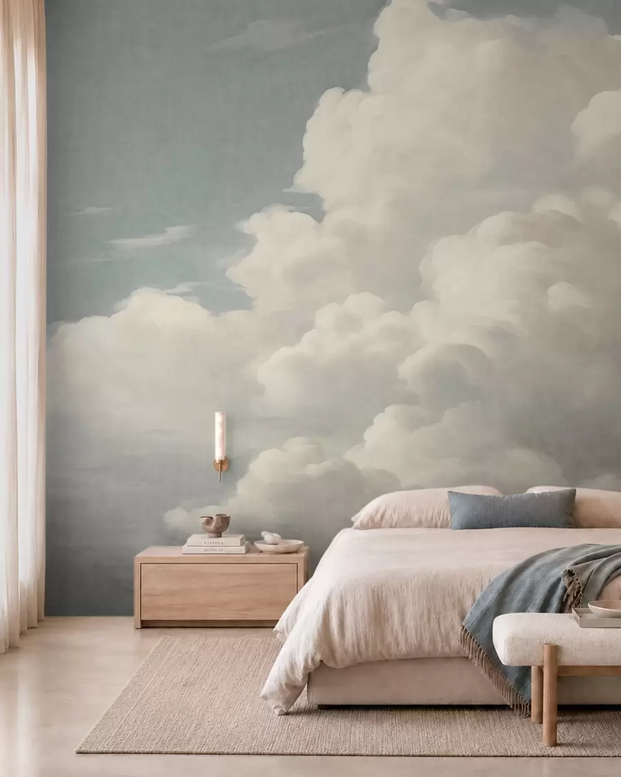 Papier peint photo Une brume nacrée, parsemée de nuages doux et crémeux qui dérivent dans un ciel serein w05855