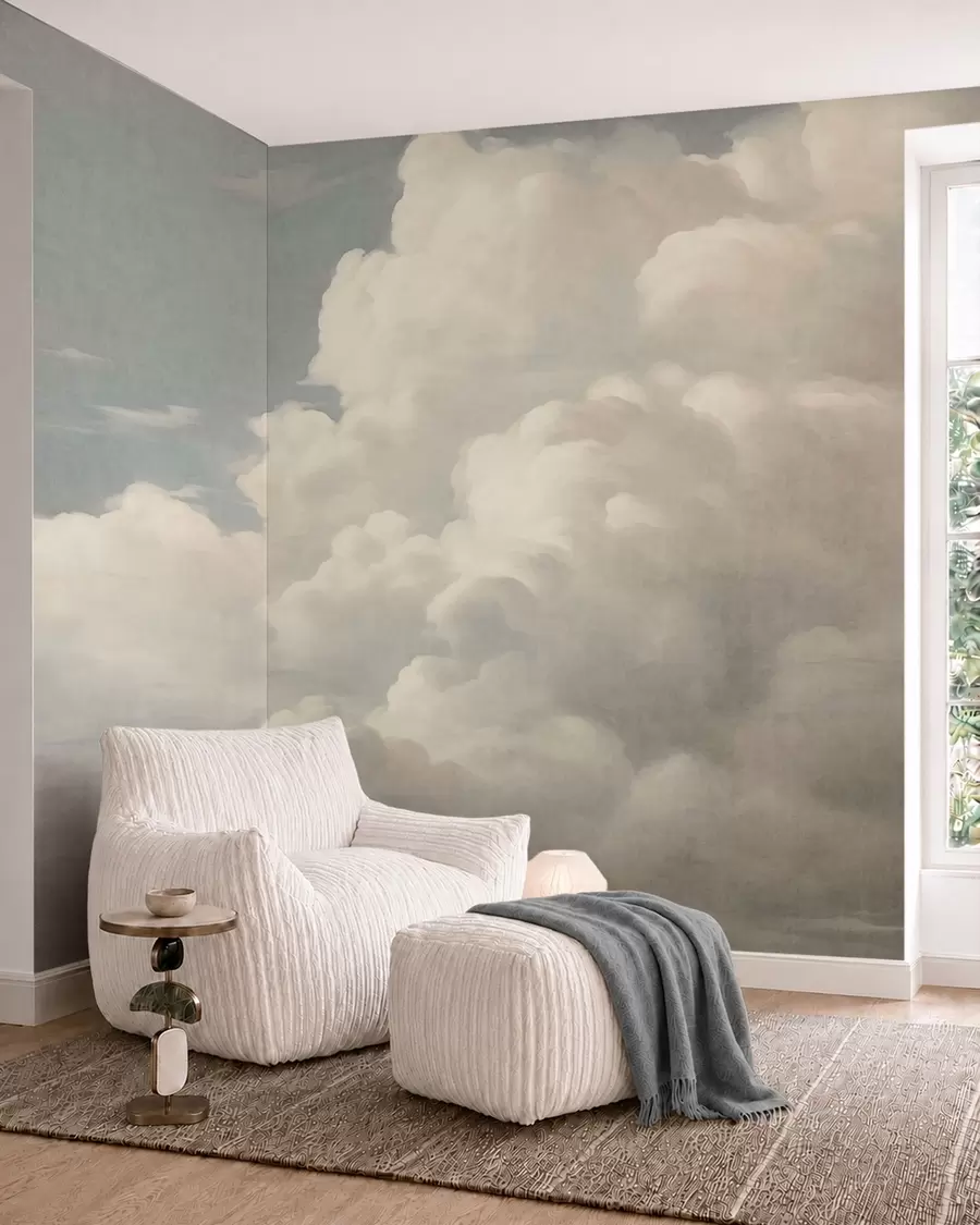 Papier peint photo Une brume nacrée, parsemée de nuages doux et crémeux qui dérivent dans un ciel serein w05855