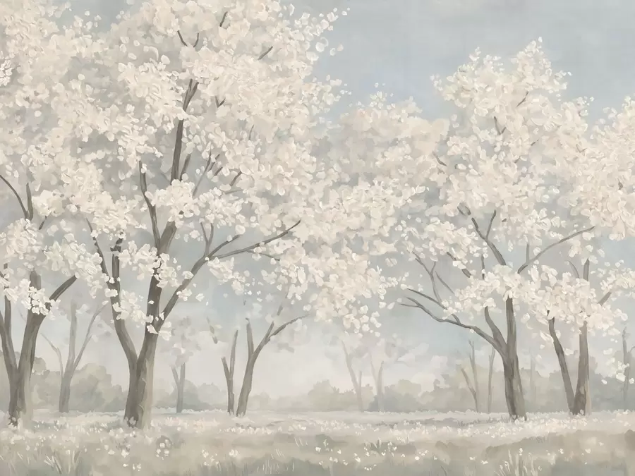 Papier peint photo Des arbres en fleurs aux teintes pâles dans une prairie aux tons pastel w05897