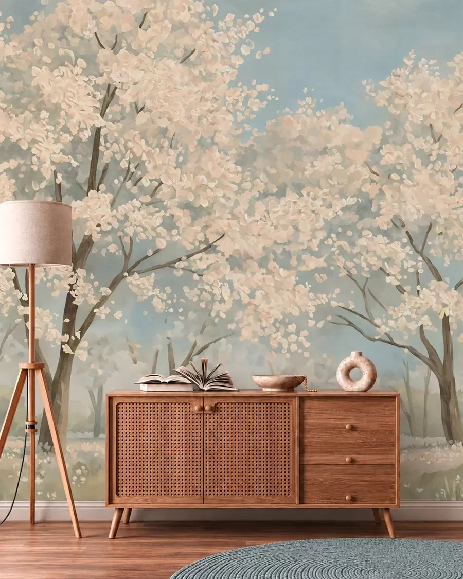 Papier peint photo Des arbres en fleurs aux teintes pâles sous un ciel d'un bleu tendre w05897v1