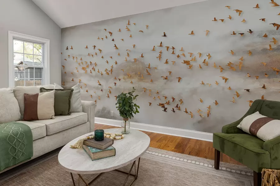 Fotobehang Zwerm vogels in de bergen u93537